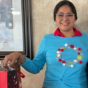Festive Blue Crew Neck Sweater with Holiday Design